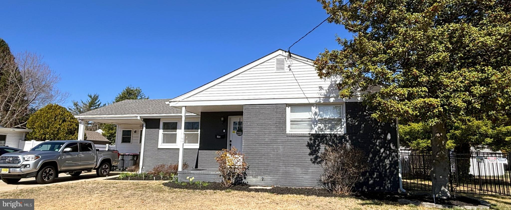205 Lucas Avenue West Berlin, NJ 08091 - Photo 3 of 25 a front view of a house with a yard