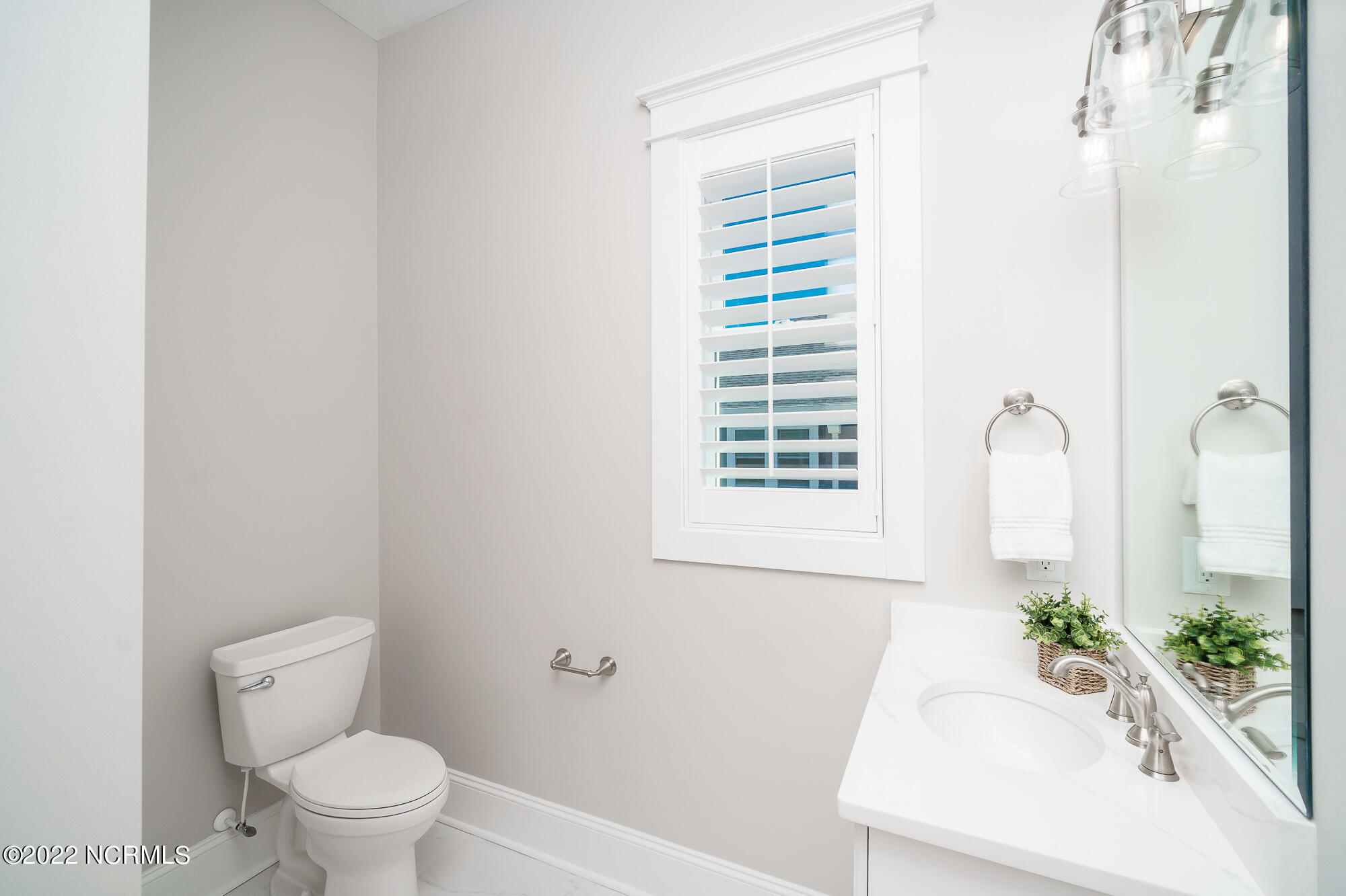 134 Ocean Bluff Drive Atlantic Beach, NC 28512 - Photo 21 of 64 Half bathroom