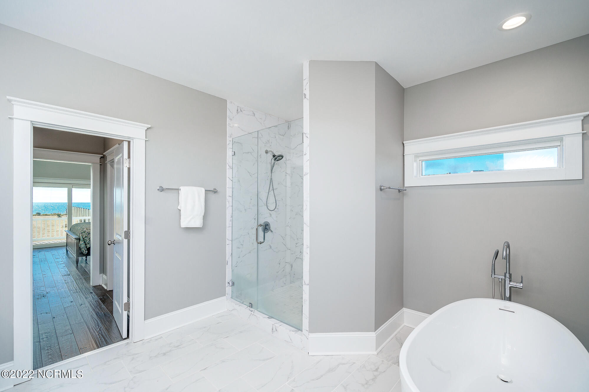 134 Ocean Bluff Drive Atlantic Beach, NC 28512 - Photo 25 of 64 En suite primary bathroom