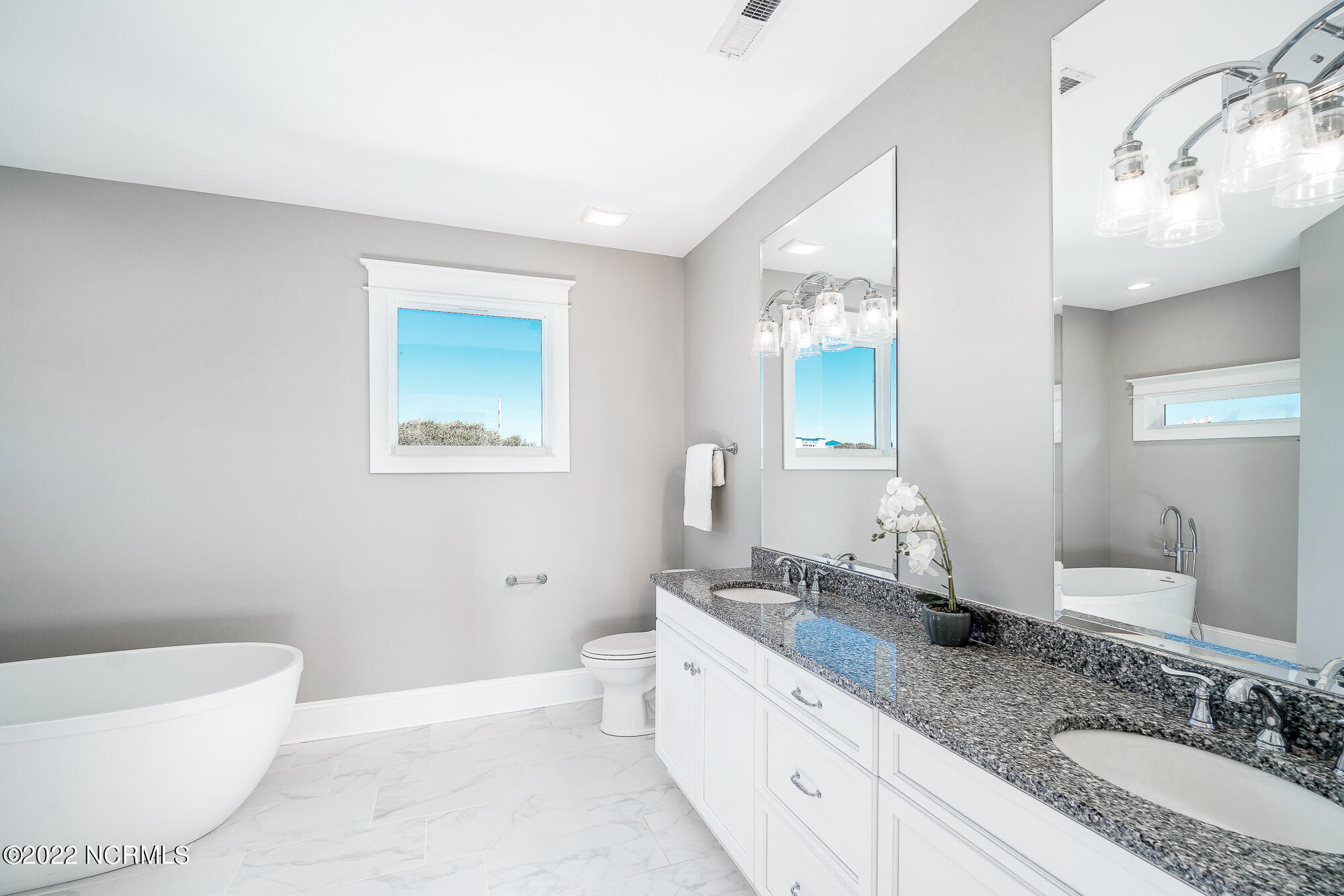 134 Ocean Bluff Drive Atlantic Beach, NC 28512 - Photo 26 of 64 En suite primary bathroom