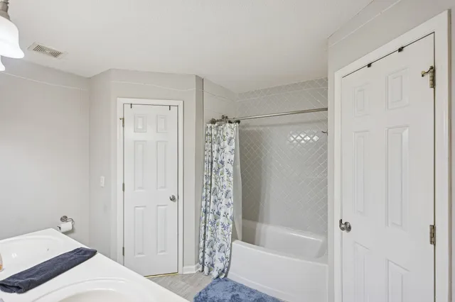 a view of an entryway with kitchen