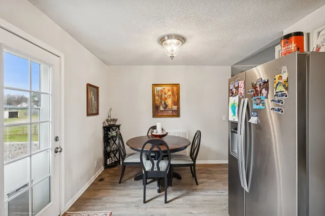 a bedroom with furniture and a bed