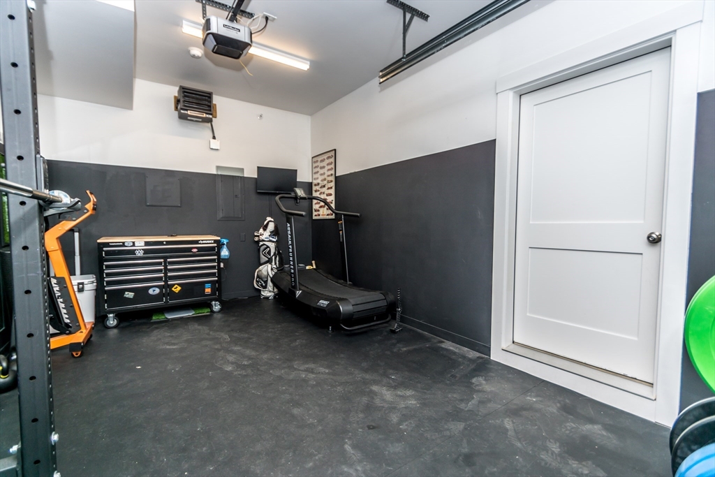 29 Cherry Street, Unit 2 Waltham, MA 02453 - Photo 32 of 32 a view of a room with gym equipment