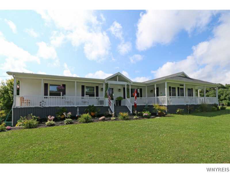 10430 South Protection Road Sardinia, NY 14030 - Photo 1 of 1 Exterior Front. Covered front porch across the ent