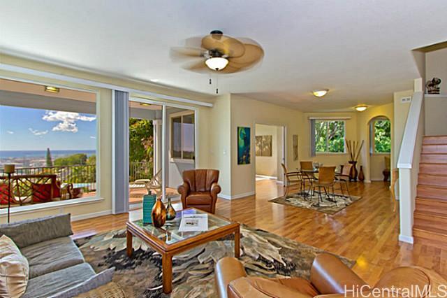 2803 Pacific Heights Road Honolulu, HI 96813 - Photo 1 of 1 a living room with furniture and a large window