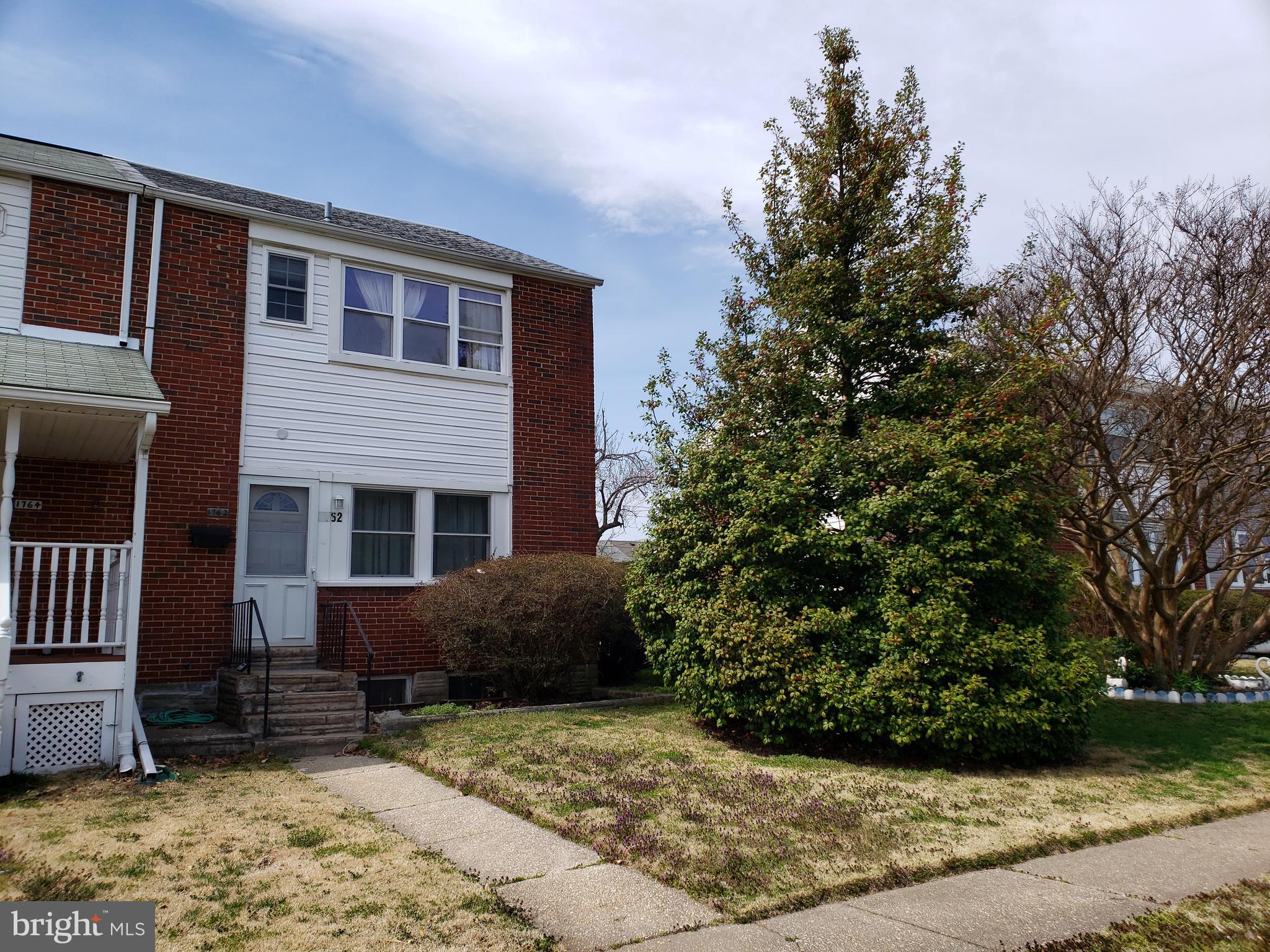 1762 Melbourne Road Baltimore, MD 21222 - Photo 1 of 40 a view of a house with a yard and sitting area