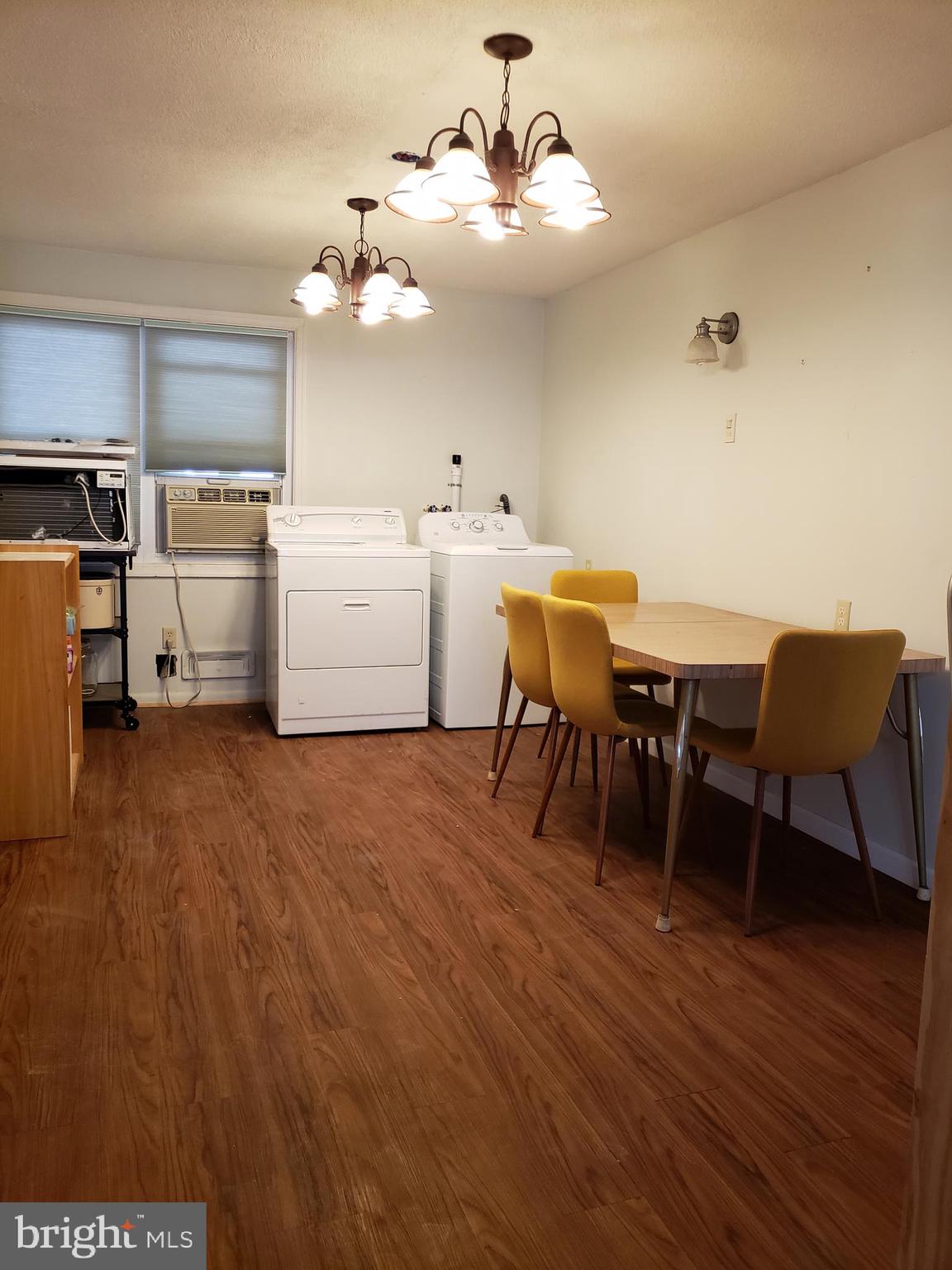 1762 Melbourne Road Baltimore, MD 21222 - Photo 9 of 40 a view of a dining room with furniture and wooden floor