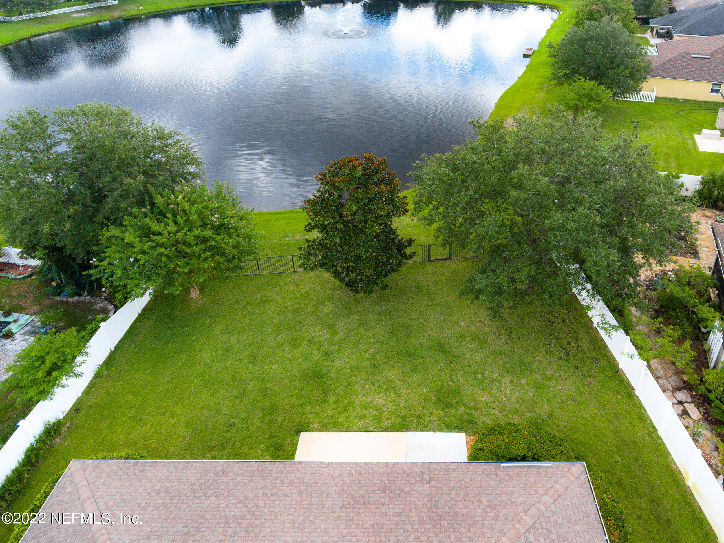 892 East Red House Branch Road St. Augustine, FL 32084 - Photo 4 of 42 a view of a garden with a lake