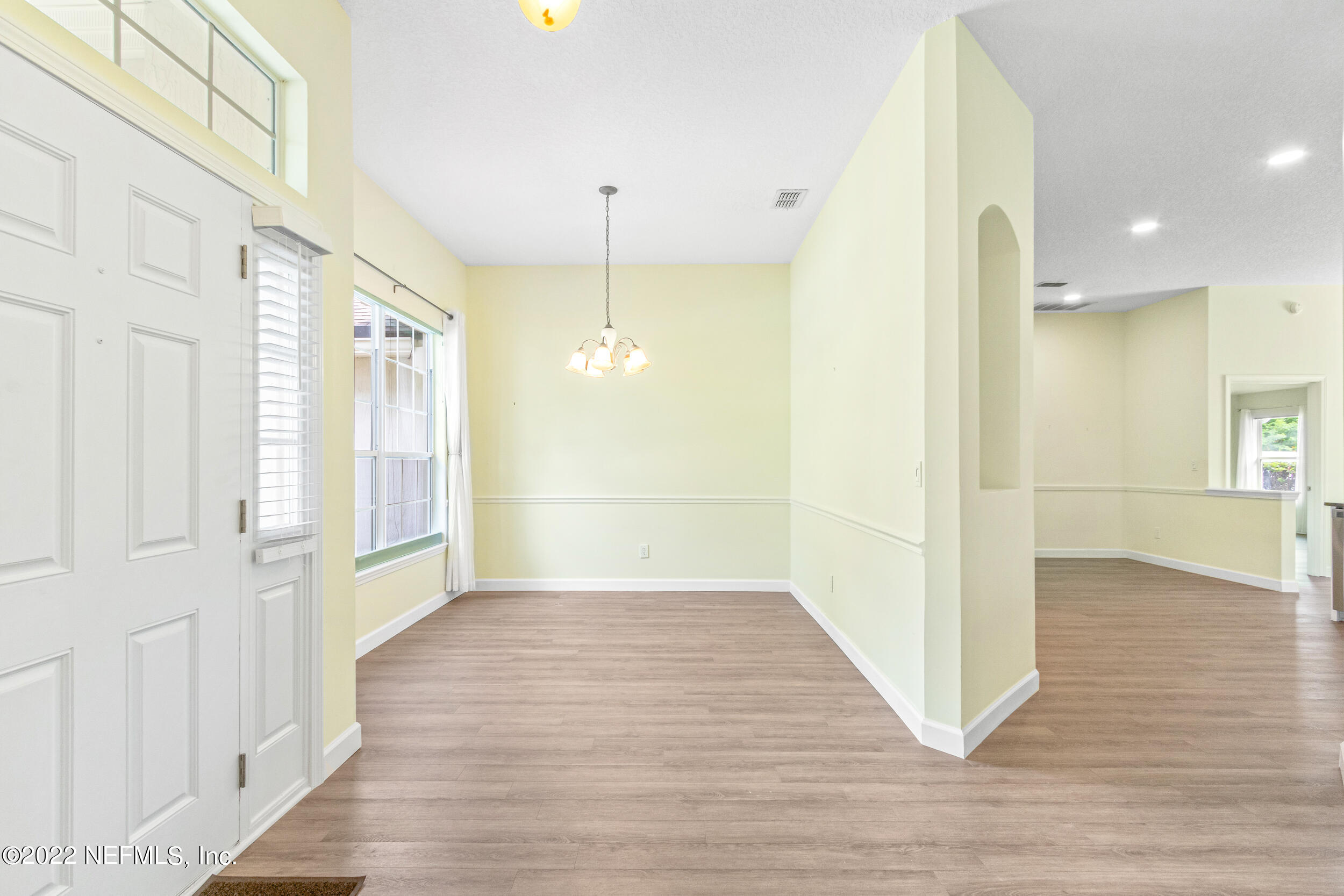 892 East Red House Branch Road St. Augustine, FL 32084 - Photo 10 of 42 a view of a hallway with wooden floor