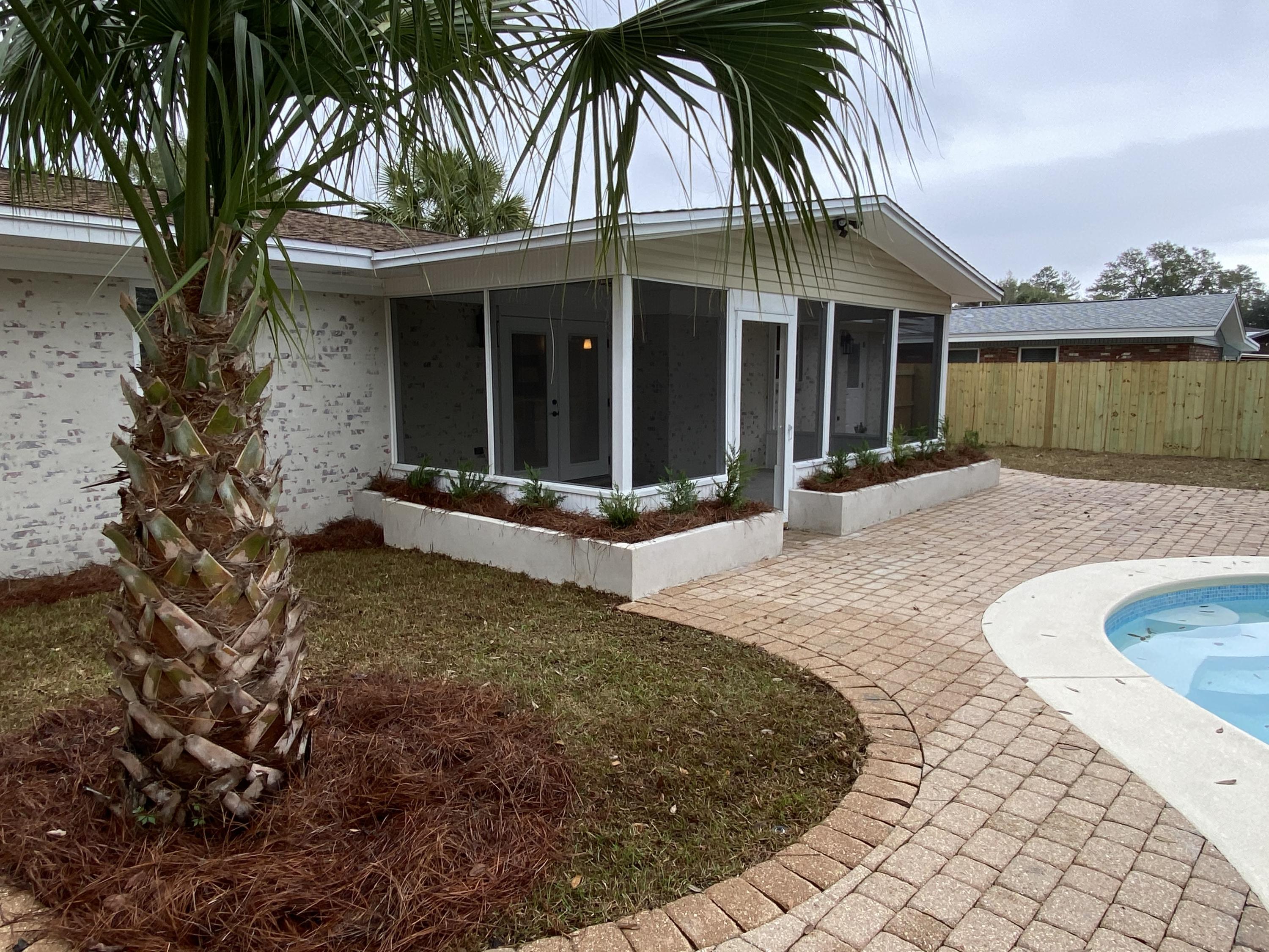 321 St Andrews Drive Niceville, FL 32578 - Photo 13 of 15 front view of a house with a yard