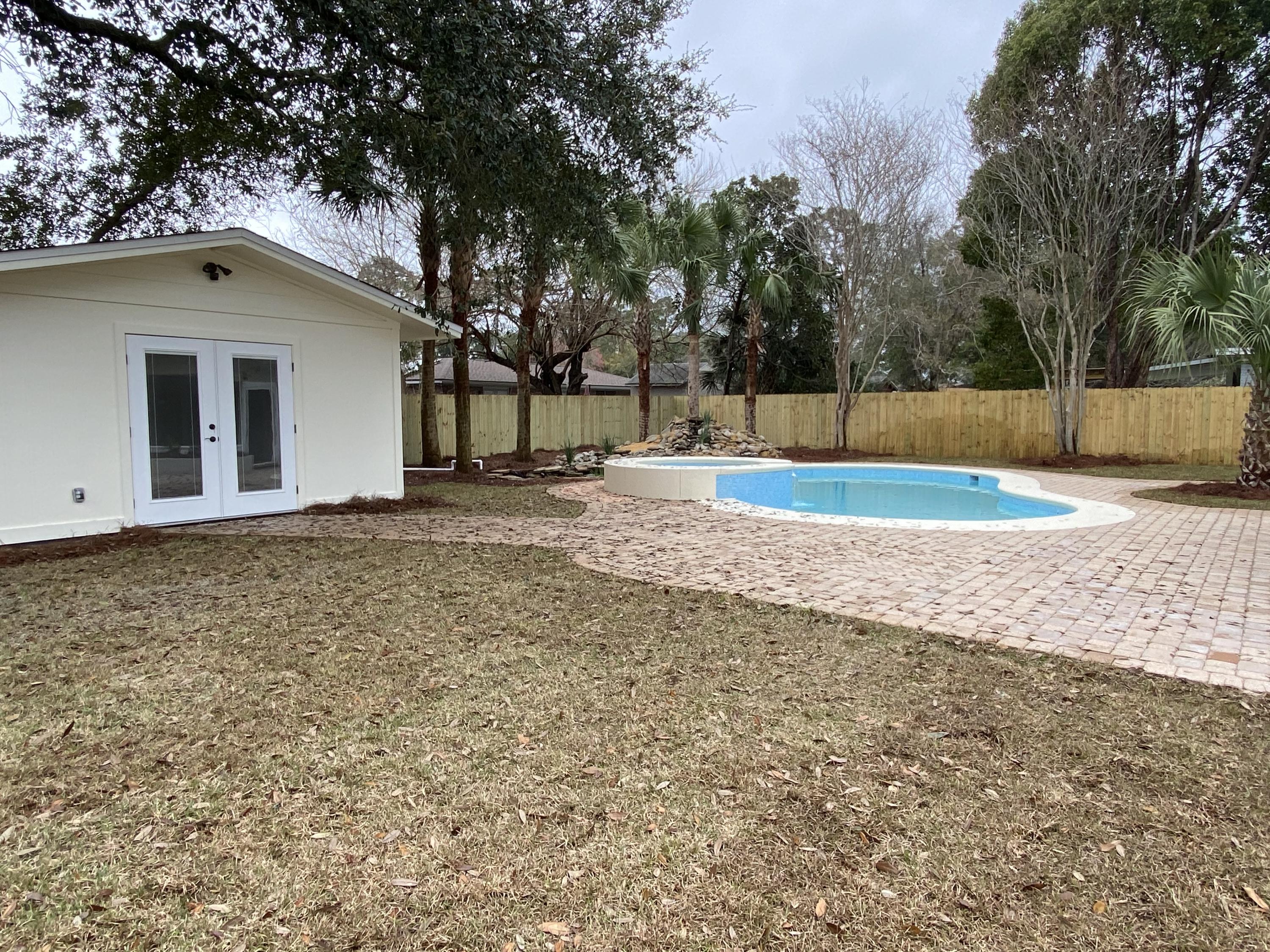 321 St Andrews Drive Niceville, FL 32578 - Photo 15 of 15 a view of a backyard