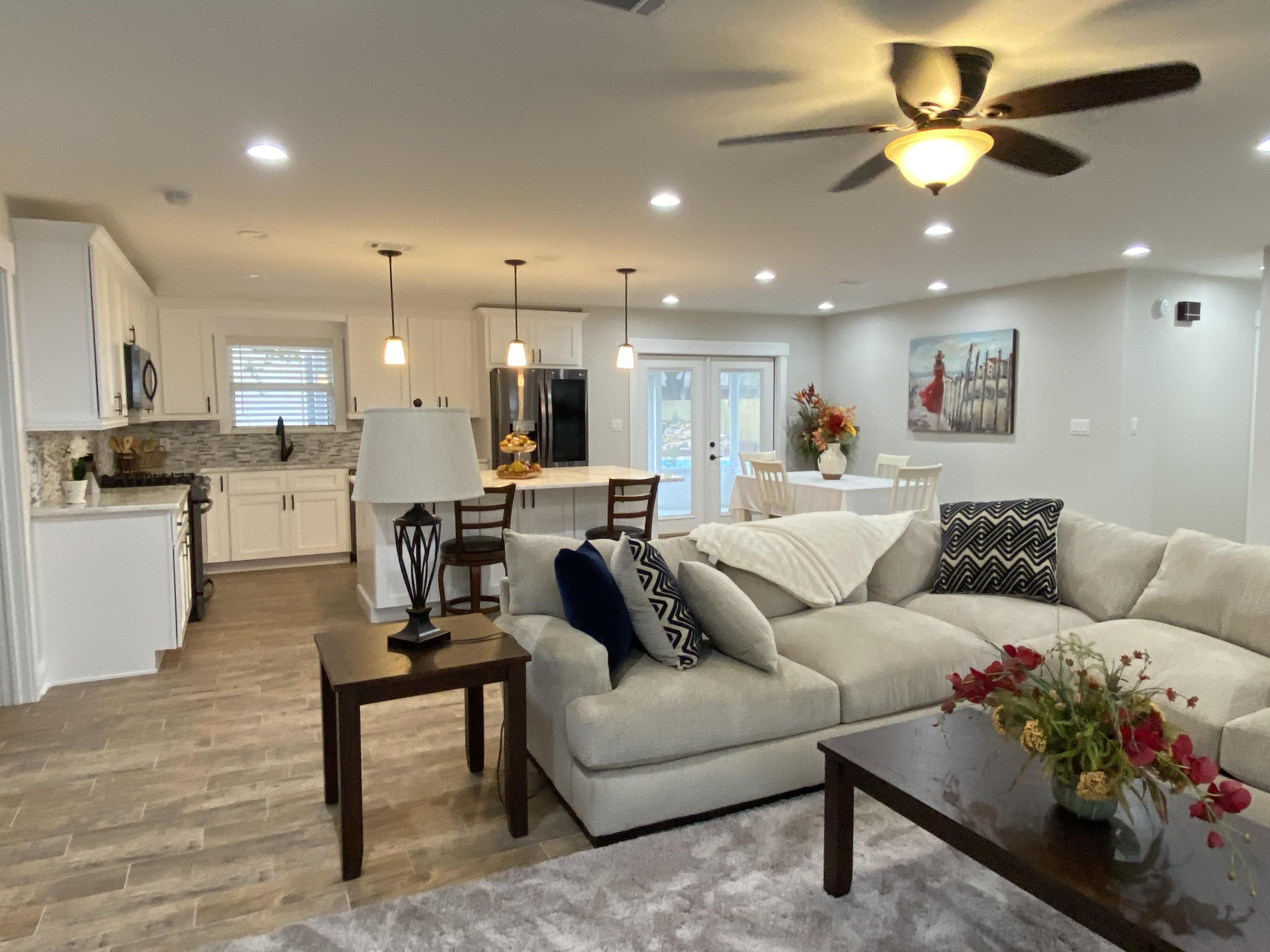 321 St Andrews Drive Niceville, FL 32578 - Photo 6 of 15 a living room with furniture and kitchen view