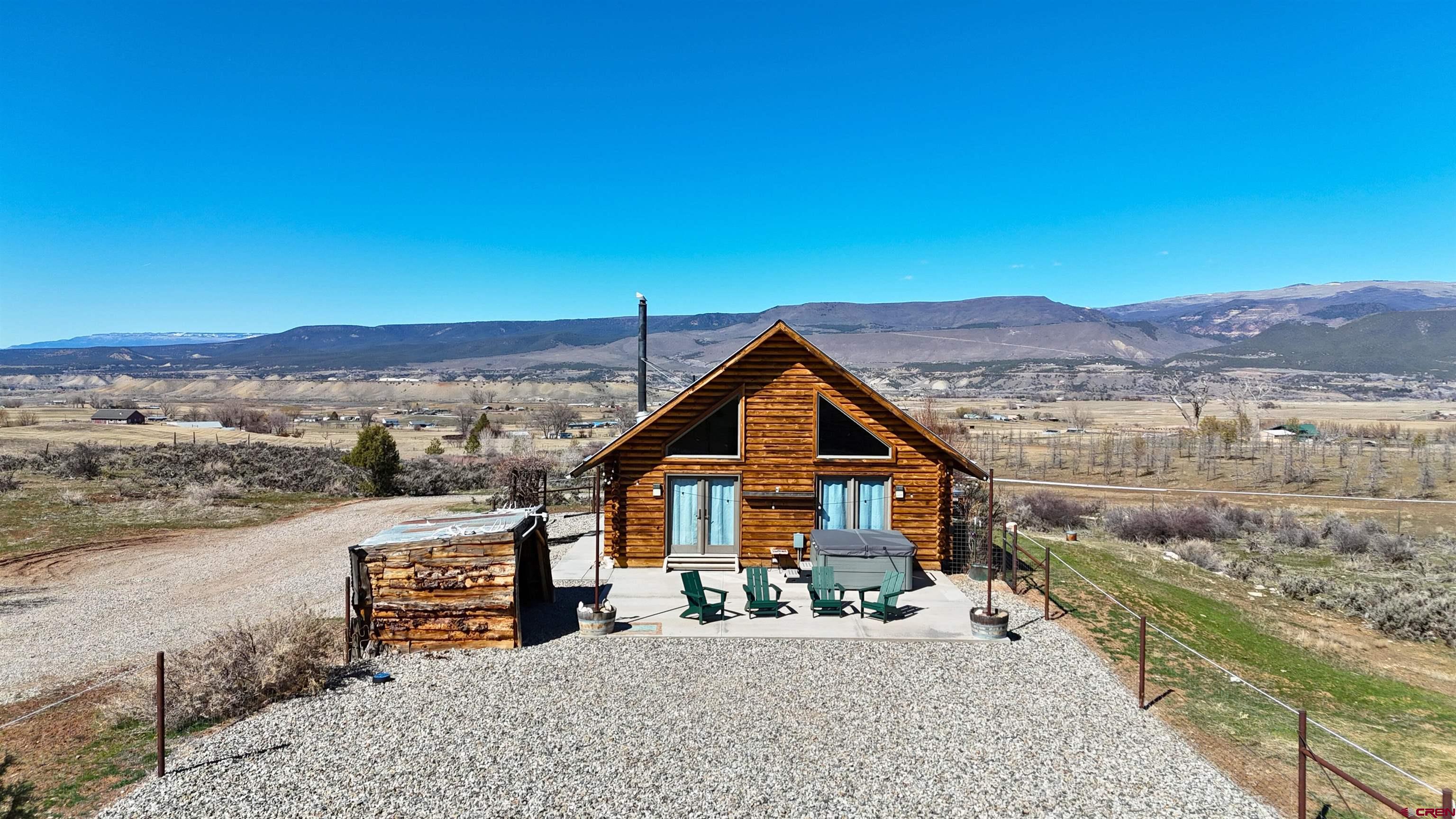 11531 4050th Road Paonia, CO 81428 - Photo 16 of 37 a view of a house with a patio