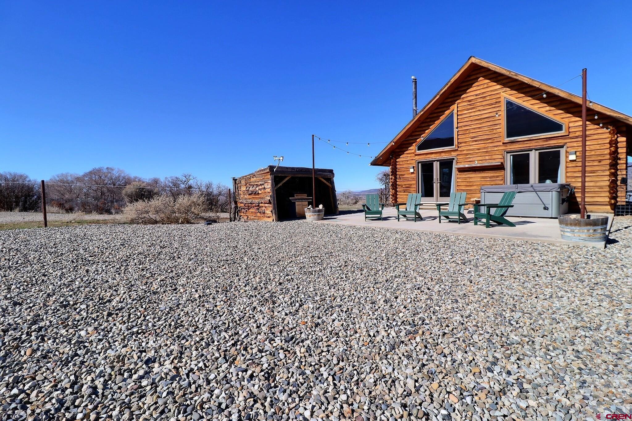 11531 4050th Road Paonia, CO 81428 - Photo 17 of 37 a front view of a house with a yard