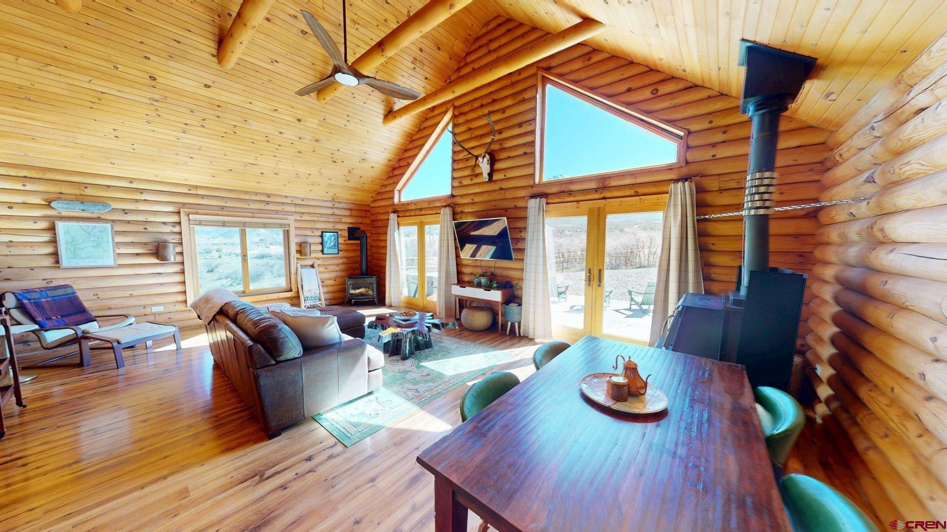 11531 4050th Road Paonia, CO 81428 - Photo 19 of 37 a living room with furniture and a large window