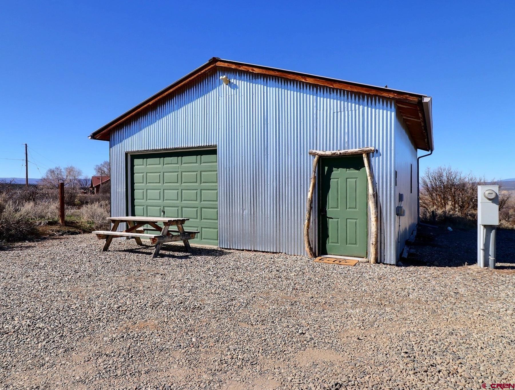 11531 4050th Road Paonia, CO 81428 - Photo 2 of 37 a view of a house with backyard and sitting area