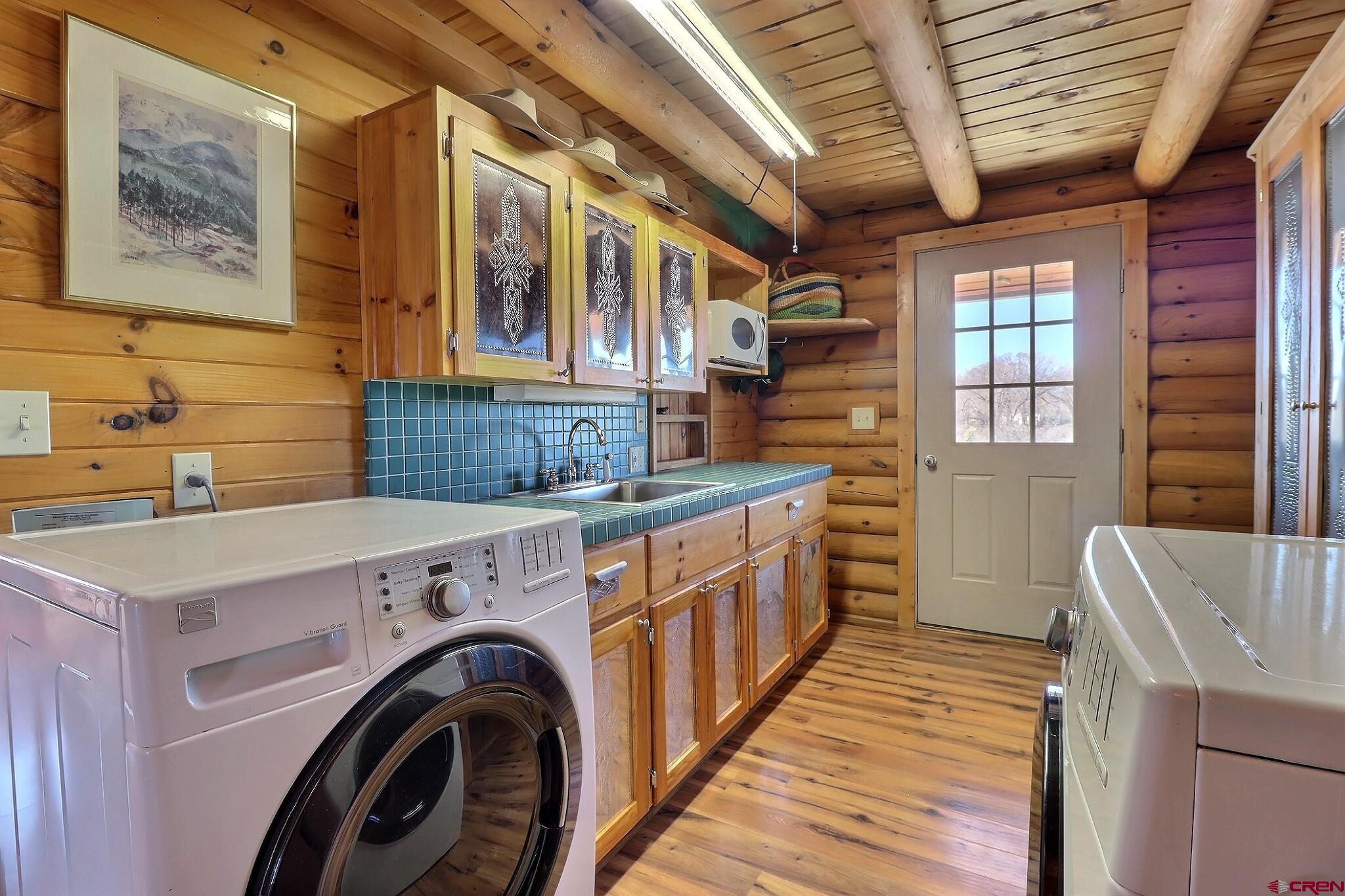 11531 4050th Road Paonia, CO 81428 - Photo 28 of 37 a utility room with dryer and washer