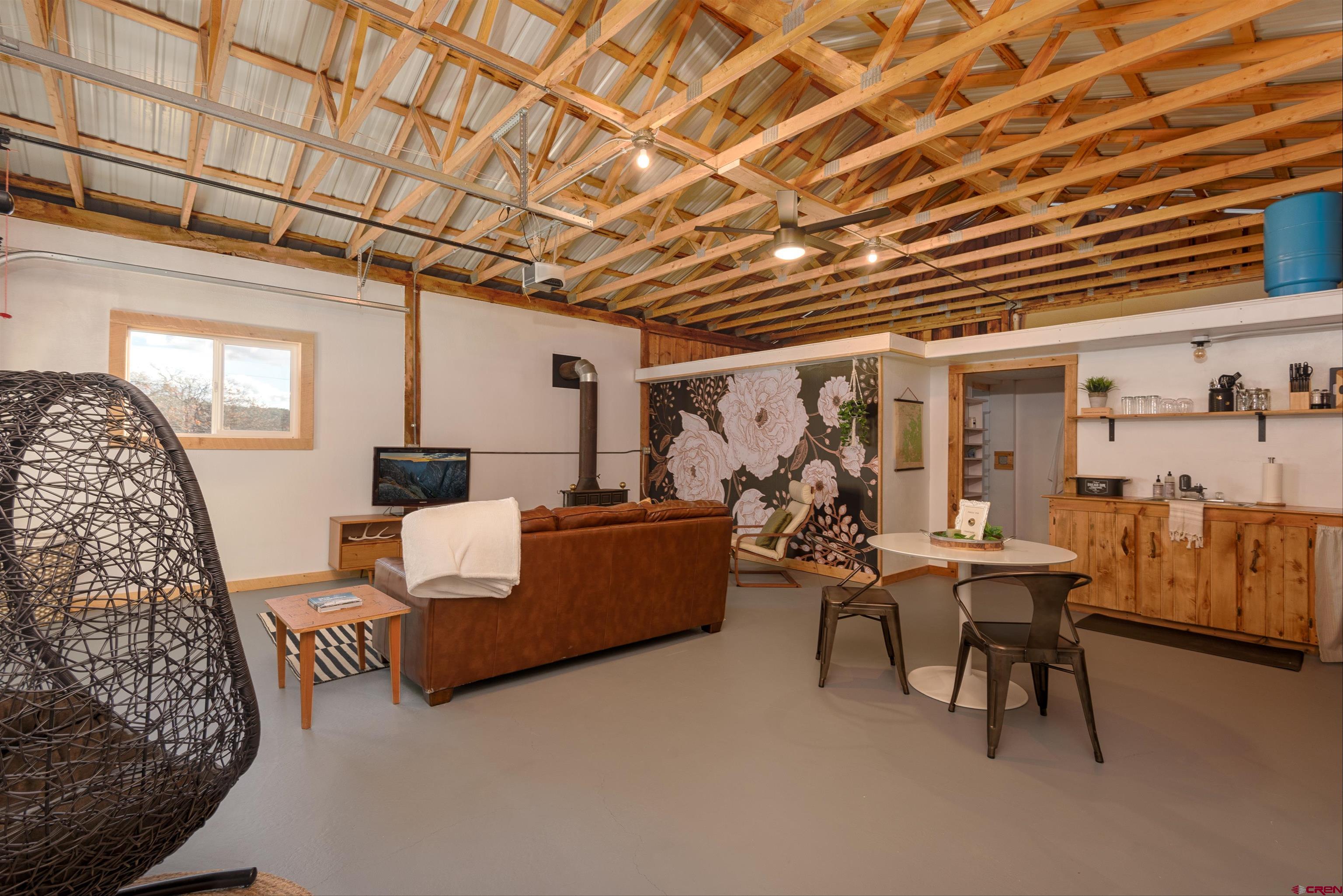 11531 4050th Road Paonia, CO 81428 - Photo 3 of 37 a living room with furniture and a large window