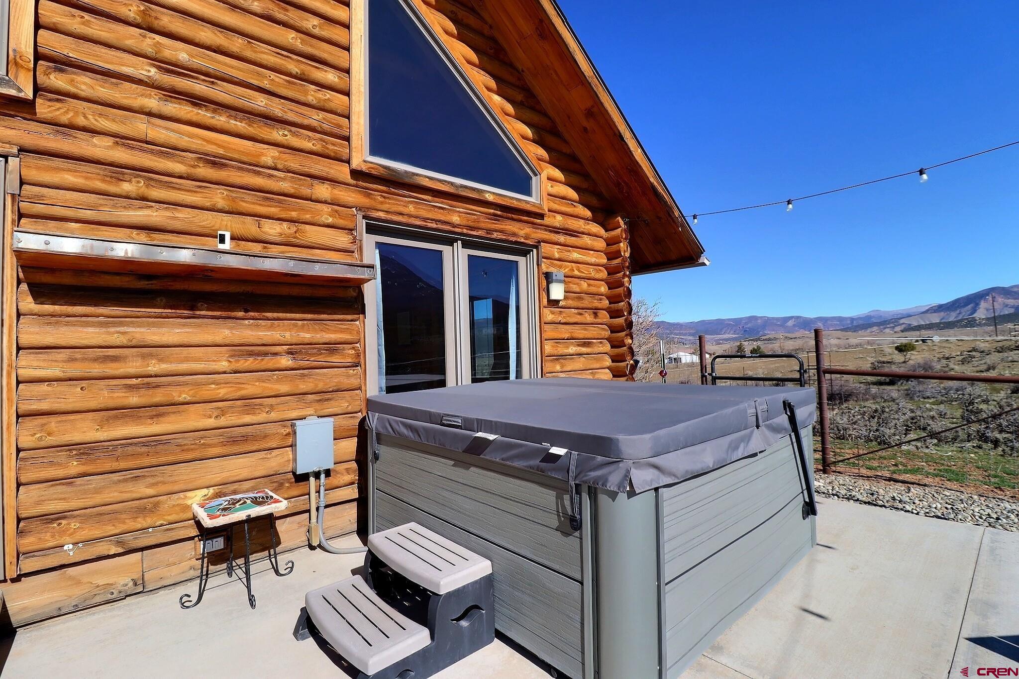 11531 4050th Road Paonia, CO 81428 - Photo 31 of 37 a view of a balcony with furniture and a ceiling fan