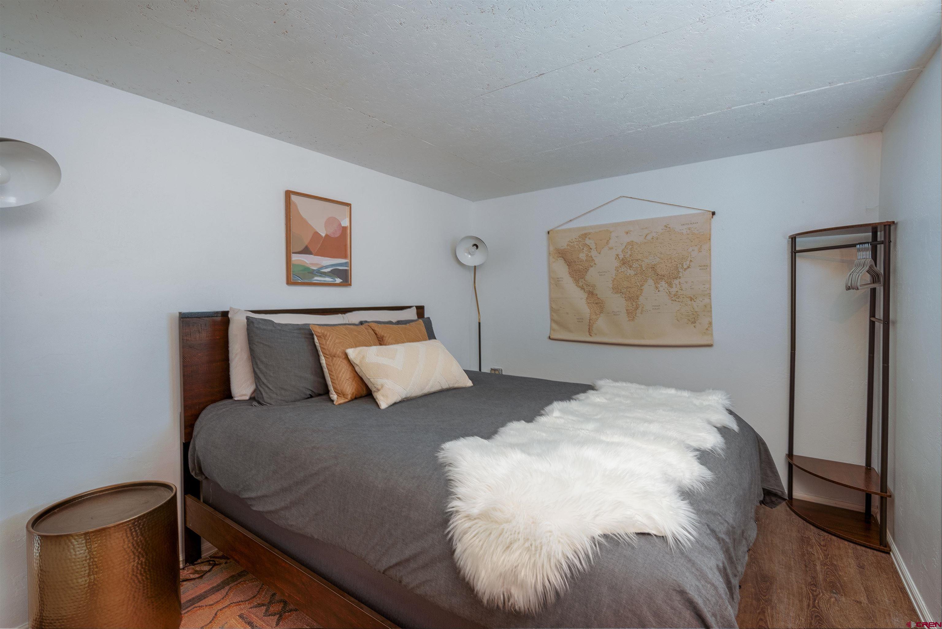 11531 4050th Road Paonia, CO 81428 - Photo 33 of 37 a bed room with a bed and a night stand