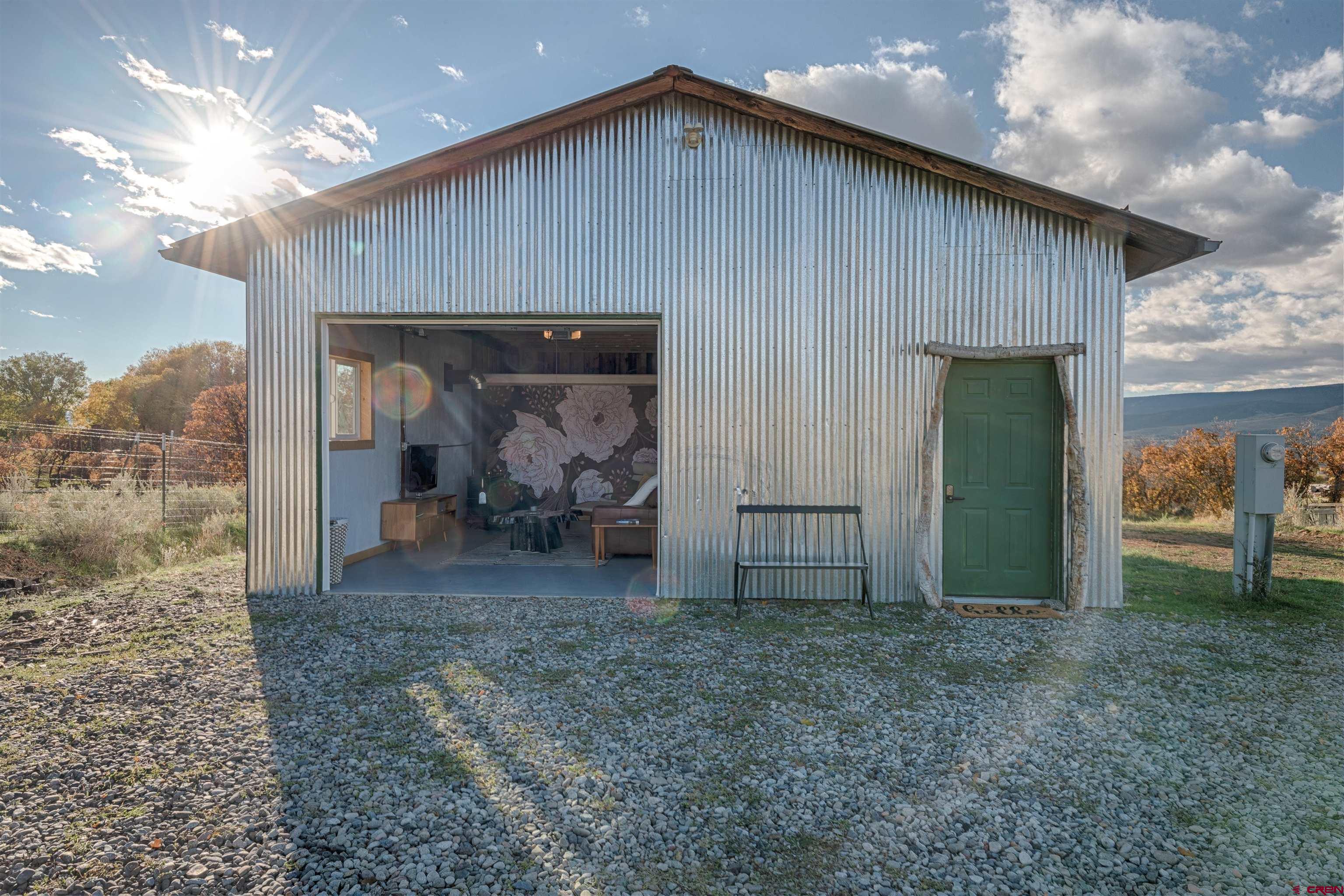 11531 4050th Road Paonia, CO 81428 - Photo 35 of 37 a view of a house with a backyard