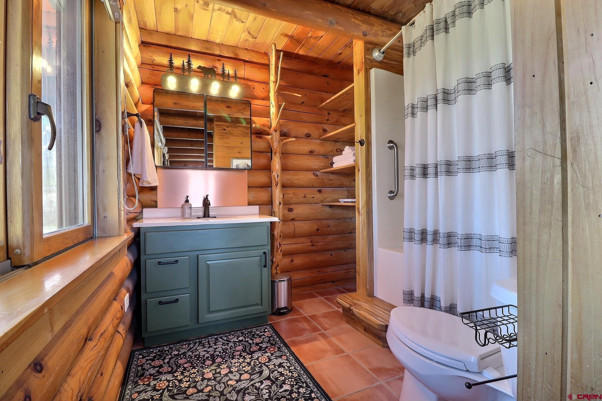 11531 4050th Road Paonia, CO 81428 - Photo 8 of 37 a bathroom with a sink and a mirror