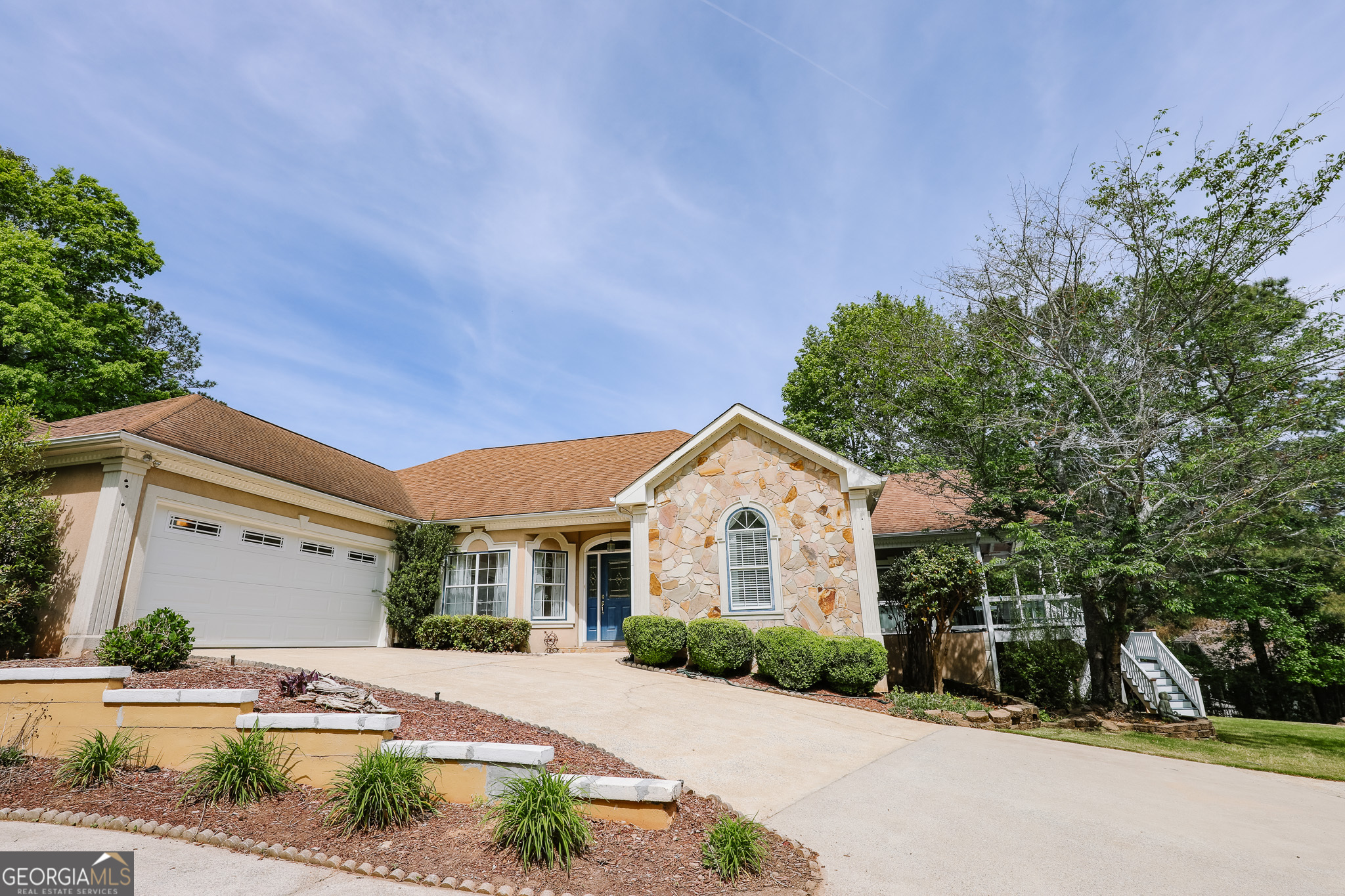7404 Golfers Point Villa Rica, GA 30180 - Photo 2 of 21 a front view of a house with a yard