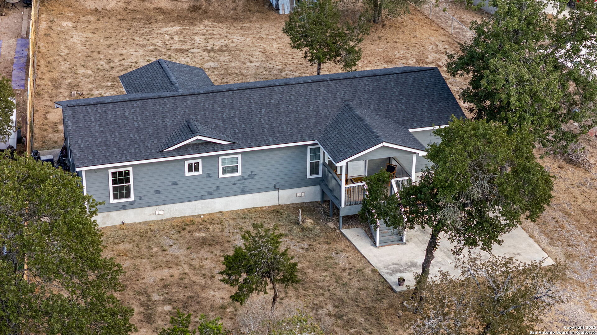 974 South Addison Street San Antonio, TX 78264 - Photo 26 of 37 front view of a house with a yard