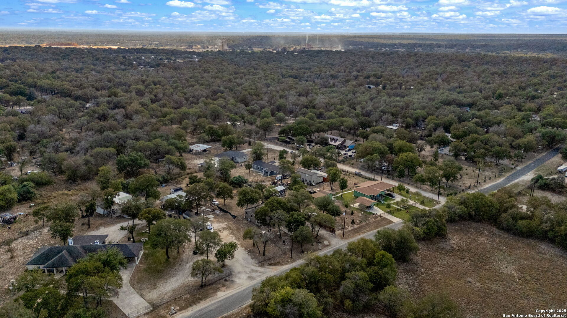 974 South Addison Street San Antonio, TX 78264 - Photo 29 of 37 an aerial view of residential houses with outdoor space and trees