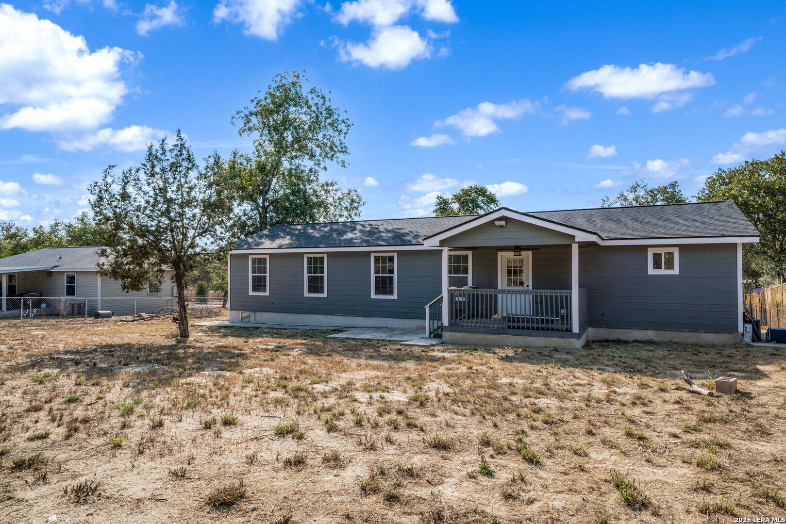 974 South Addison Street San Antonio, TX 78264 - Photo 36 of 37 a front view of a house with a yard