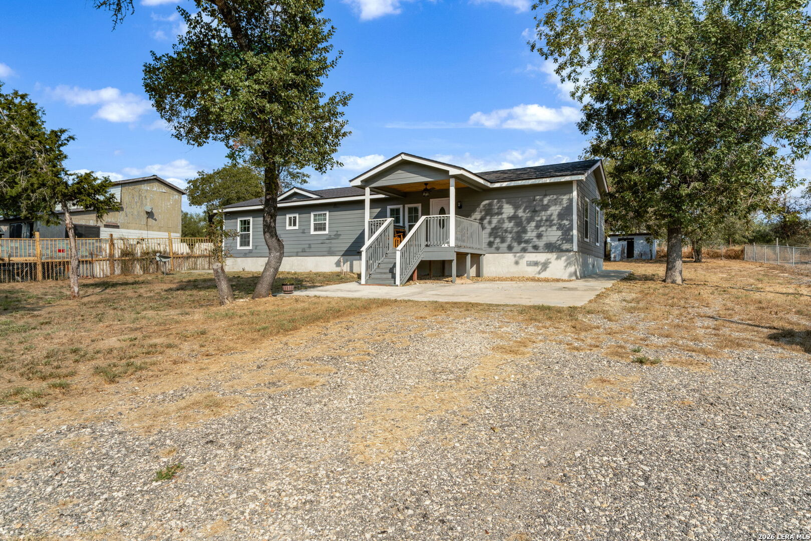 974 South Addison Street San Antonio, TX 78264 - Photo 4 of 37 a front view of a house with a yard