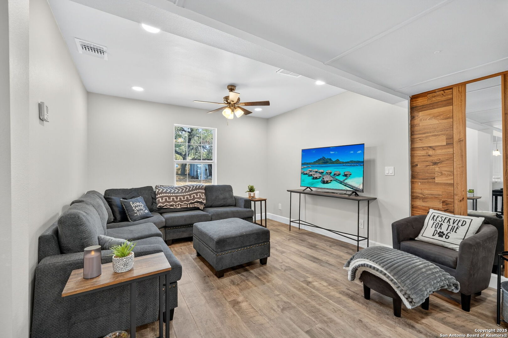 974 South Addison Street San Antonio, TX 78264 - Photo 8 of 37 a living room with furniture and a flat screen tv