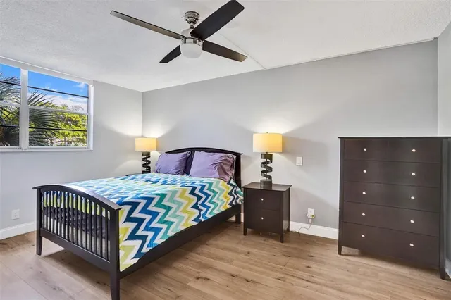 a view of a swimming pool with a yard