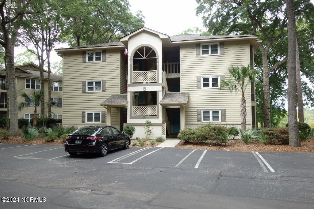 221 Clubhouse Road, Unit 4 Sunset Beach, NC 28468 - Photo 1 of 52 Front View