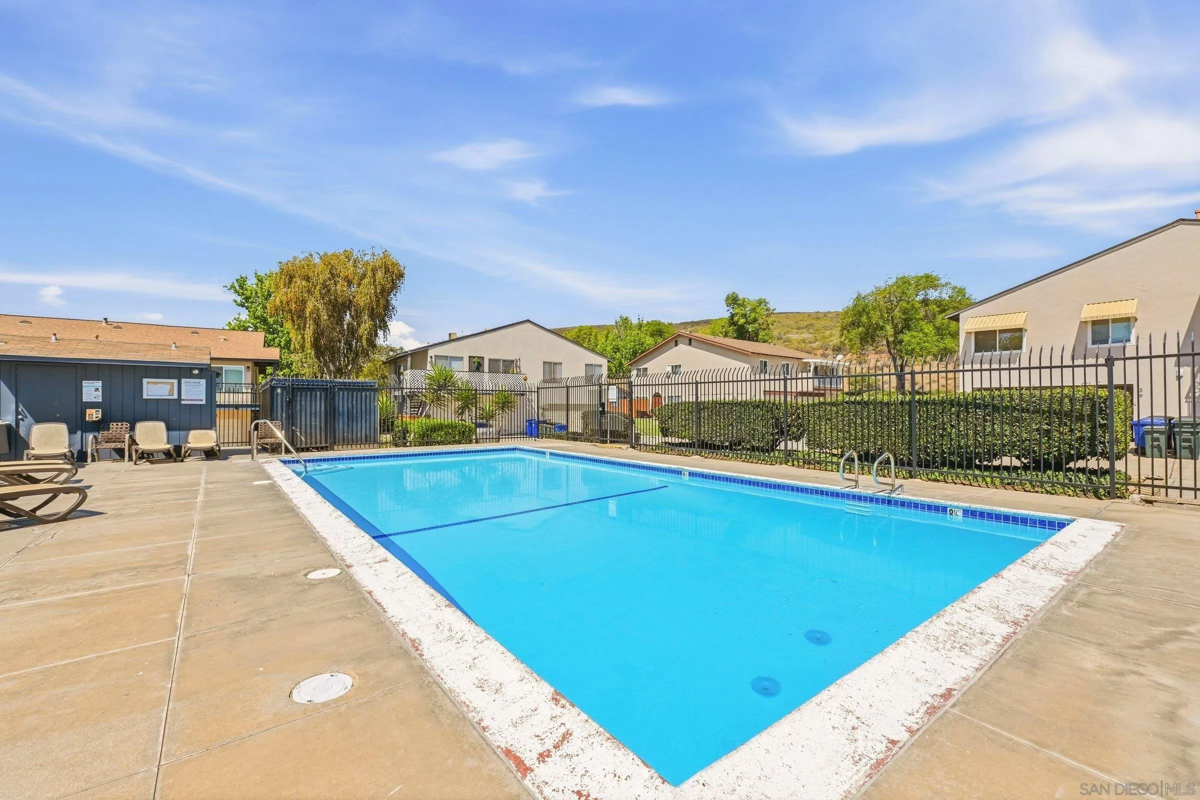 13884 Via Rimini San Diego, CA 92129 - Photo 24 of 24 a view of swimming pool with outdoor seating and city view
