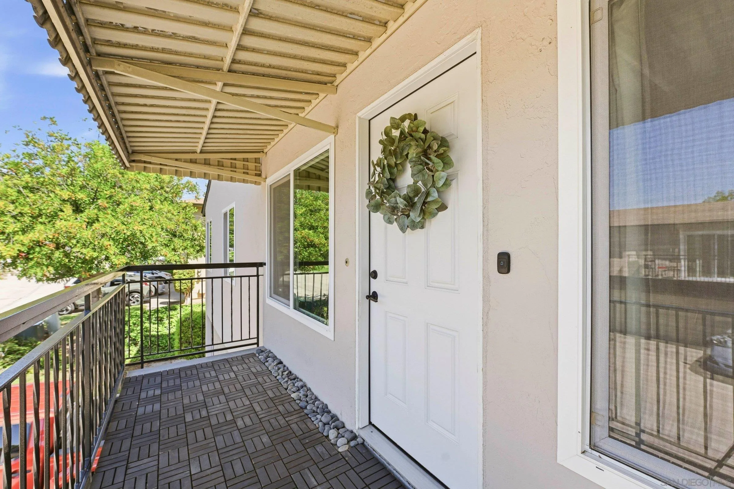 13884 Via Rimini San Diego, CA 92129 - Photo 4 of 24 a view of balcony with wooden floor