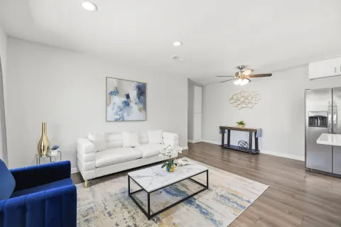 a living room with furniture and a table