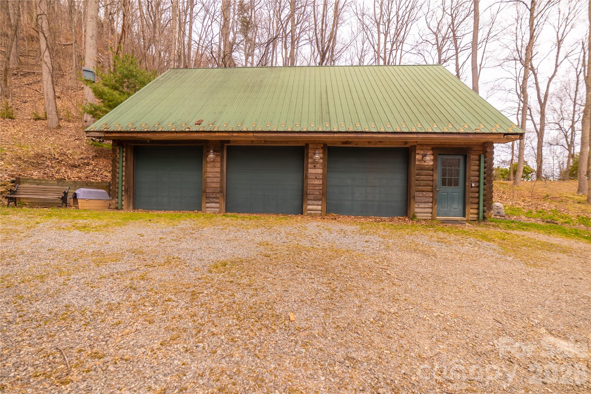 682 Rock House Road Hot Springs, NC 28743 - Photo 5 of 43 a view of a house with a yard and a large tree