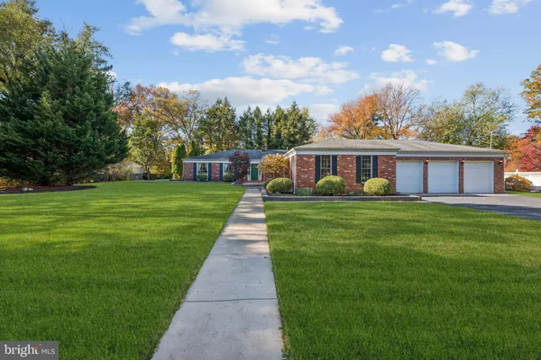 a view of a house with a big yard