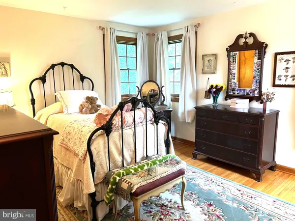 a living room with furniture fireplace and flat screen tv