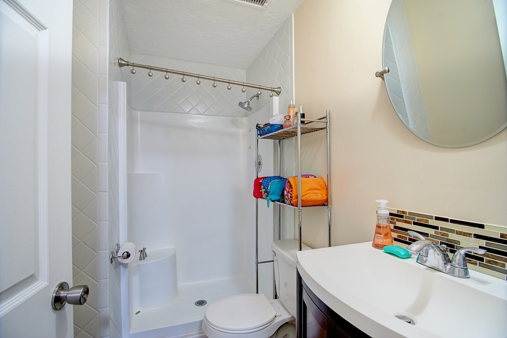35 Cobblestone Lane, Unit 35 Worcester, MA 01606 - Photo 12 of 21 a bathroom with a sink toilet and shower