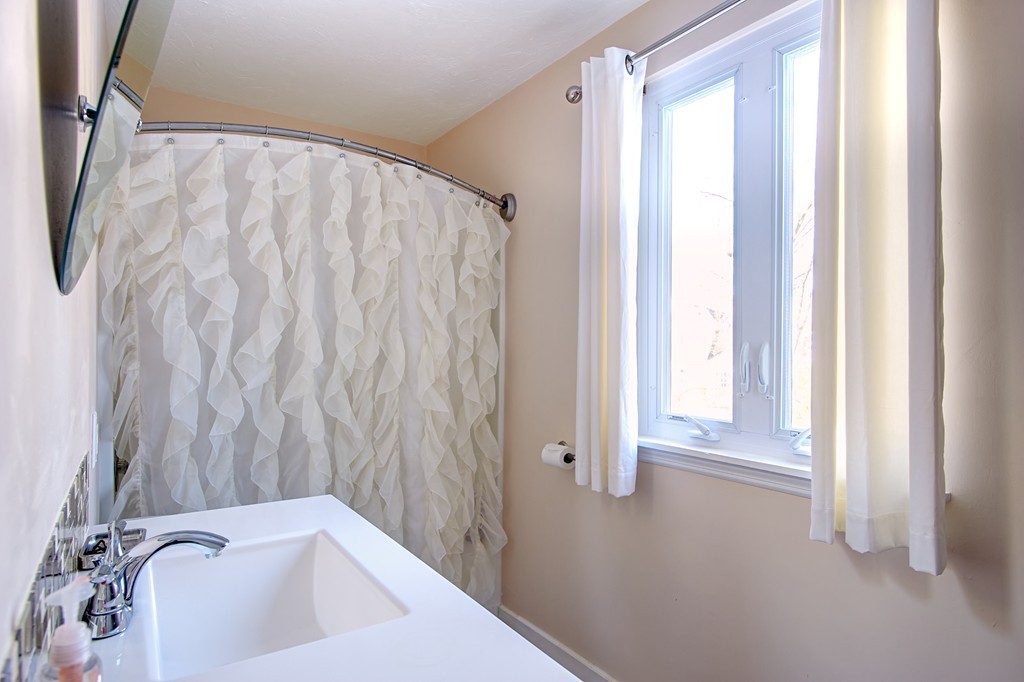 35 Cobblestone Lane, Unit 35 Worcester, MA 01606 - Photo 13 of 21 a bathroom with a bathtub and shower