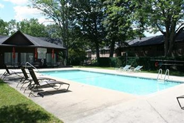35 Cobblestone Lane, Unit 35 Worcester, MA 01606 - Photo 21 of 21 a view of a house with backyard and a tree