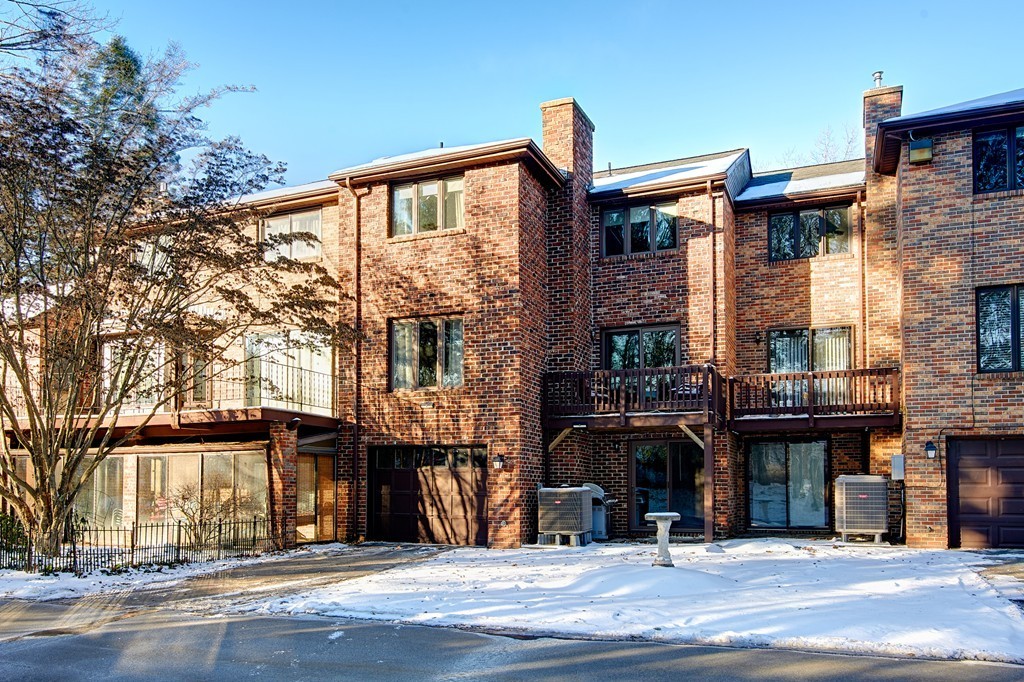 35 Cobblestone Lane, Unit 35 Worcester, MA 01606 - Photo 3 of 21 a front view of a building with street