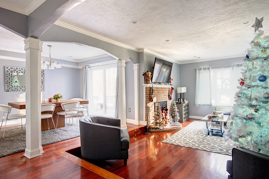 35 Cobblestone Lane, Unit 35 Worcester, MA 01606 - Photo 4 of 21 a living room with furniture and a wooden floor