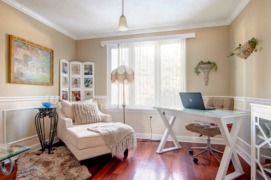 35 Cobblestone Lane, Unit 35 Worcester, MA 01606 - Photo 9 of 21 a bedroom with a bed and a table in it