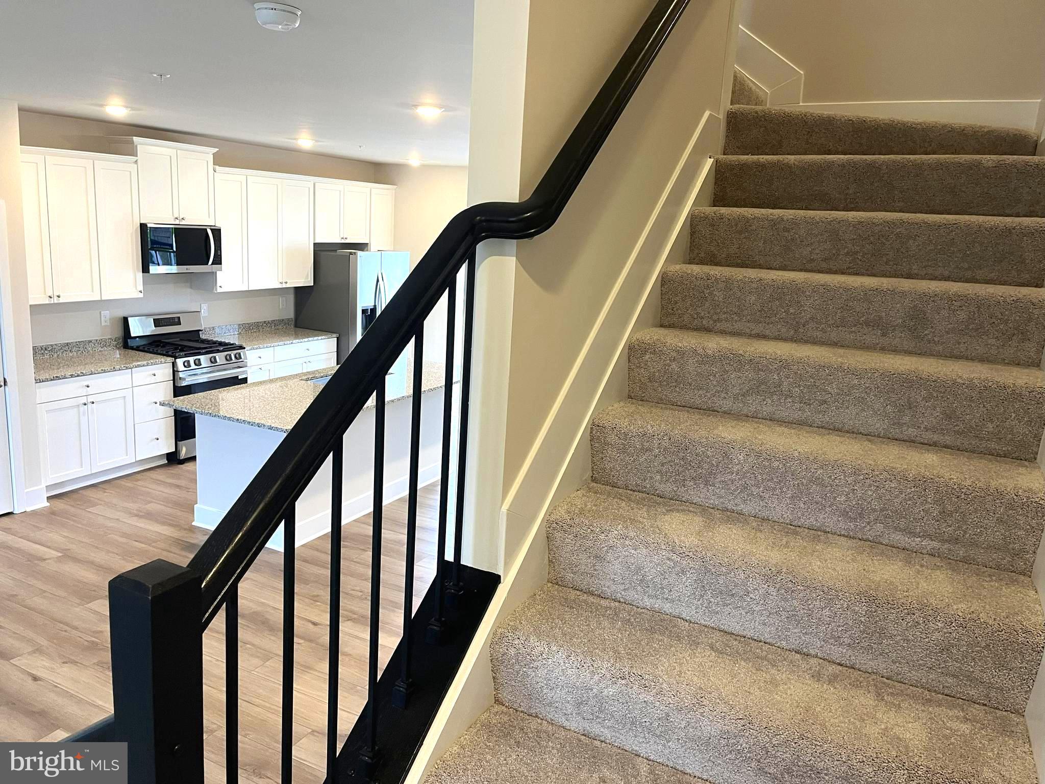 7618 Johnnycake Road Windsor Mill, MD 21244 - Photo 14 of 45 a view of entryway and kitchen