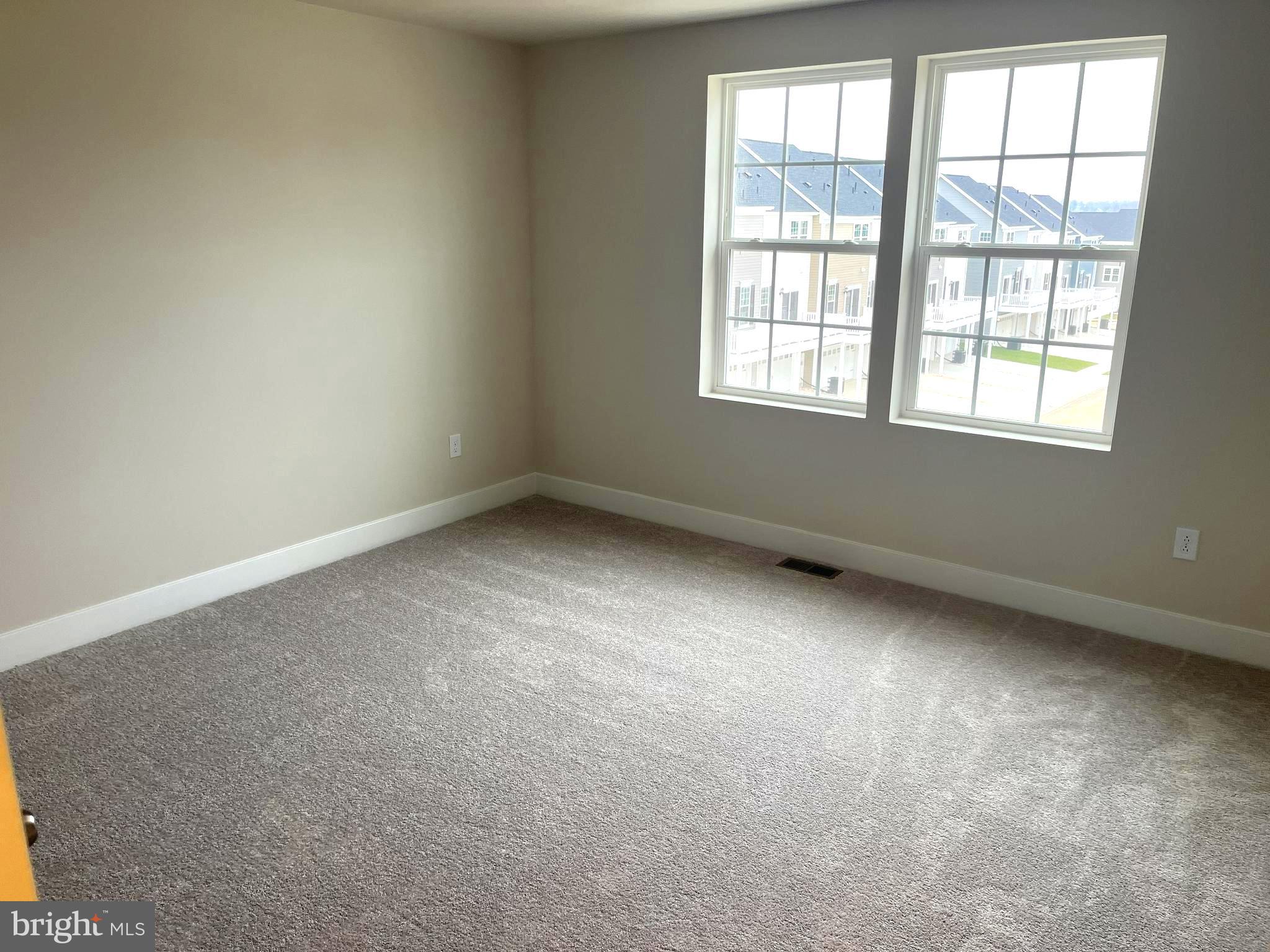 7618 Johnnycake Road Windsor Mill, MD 21244 - Photo 16 of 45 an empty room with a window