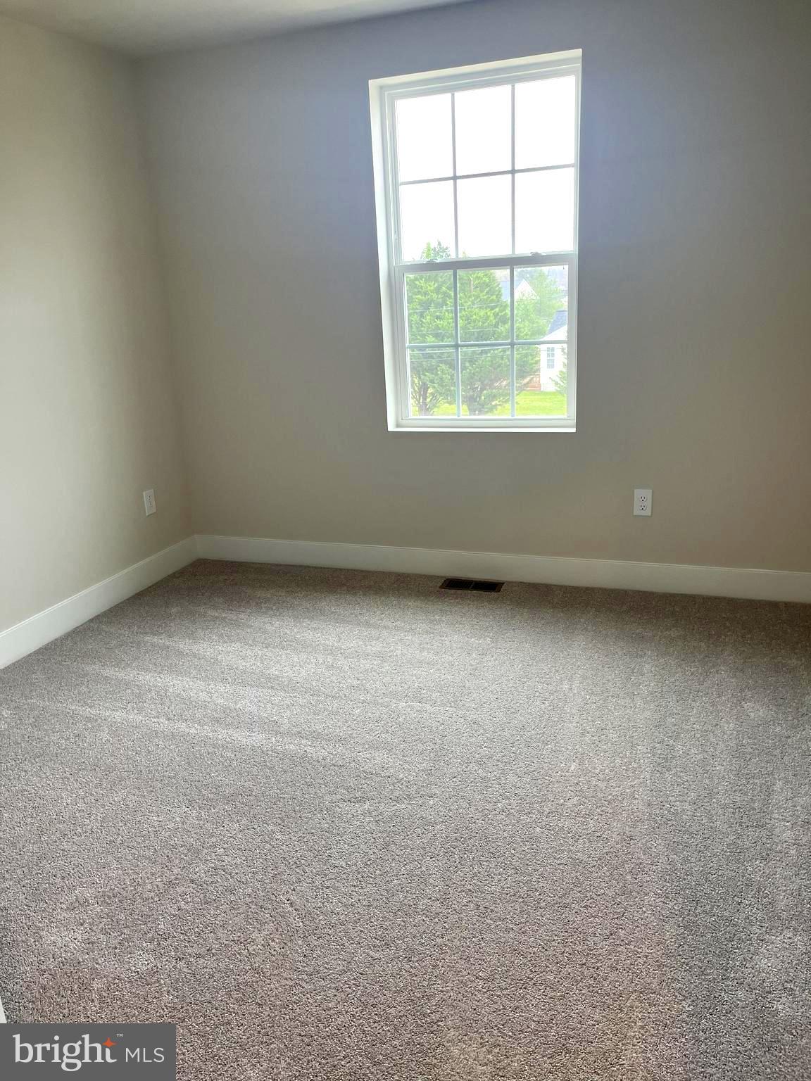 7618 Johnnycake Road Windsor Mill, MD 21244 - Photo 26 of 45 an empty room with a window