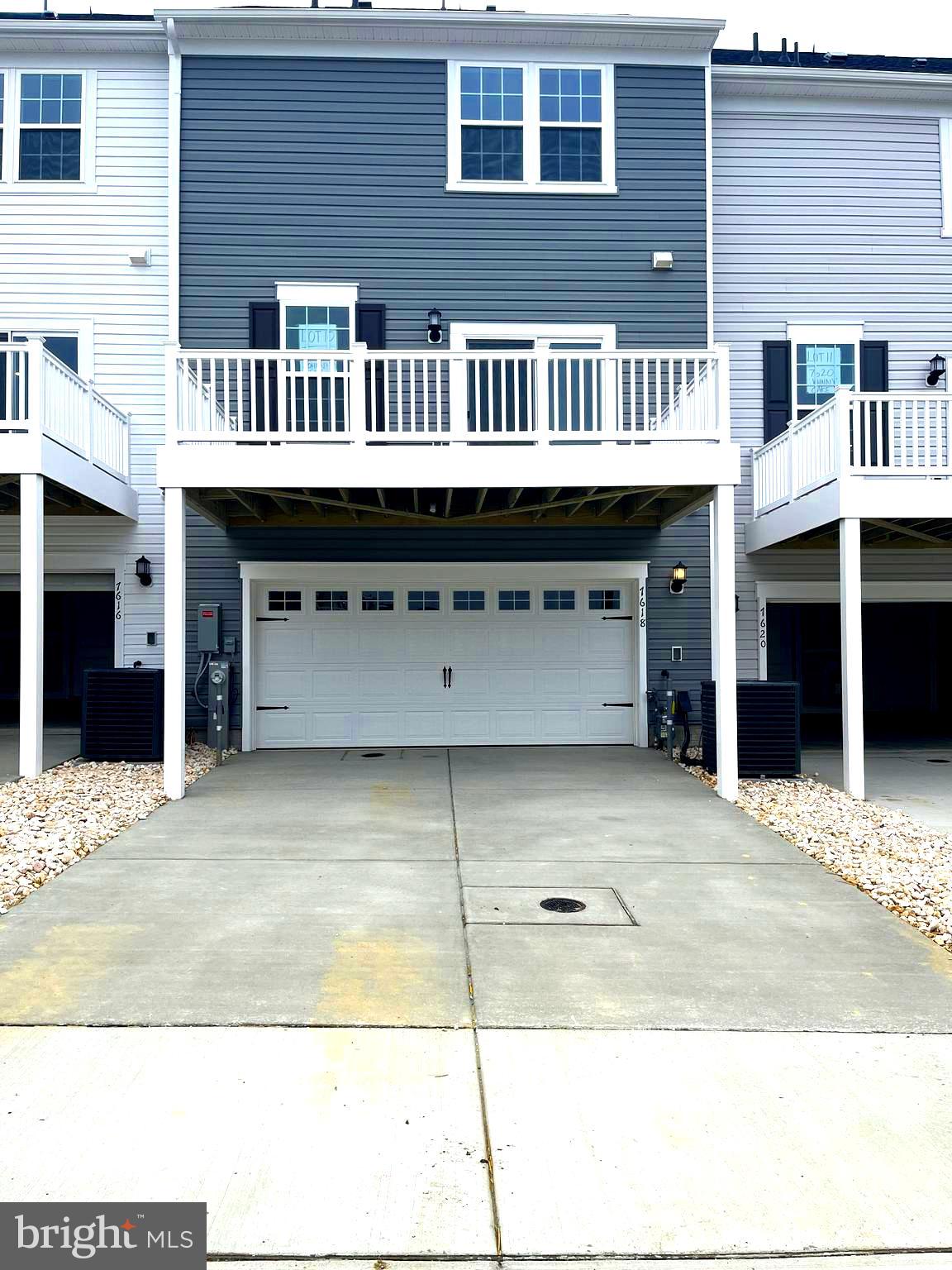 7618 Johnnycake Road Windsor Mill, MD 21244 - Photo 35 of 45 a view of a brick building with many windows
